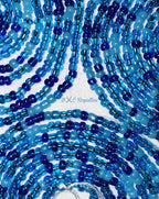 Close-up of blue beaded strands with 'BXC Royalties' branding.