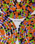Colorful beaded necklace with orange, green, black, and purple beads on a white background.