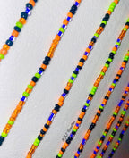 Colorful beaded strands on a white background